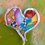 Broche multicolore en argile polymère
Dim : environ 5 x 5 cm - 34,00